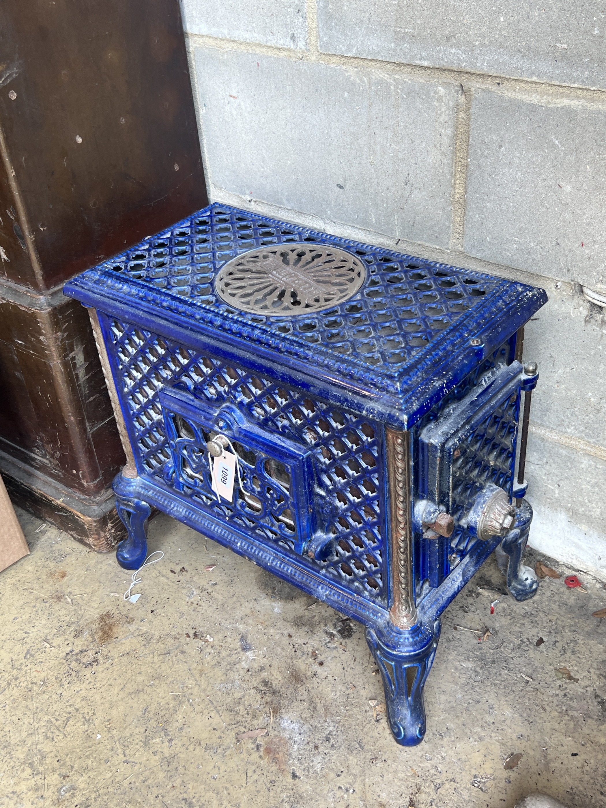 An early 20th century French Chauffette blue enamelled conservatory heater, width 54cm, depth 33cm, height 51cm